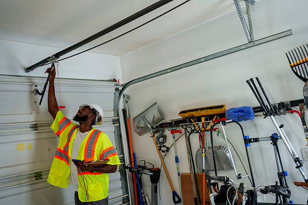 Professional Garage Door Roller Replacement technician working in Saxapahaw, NC